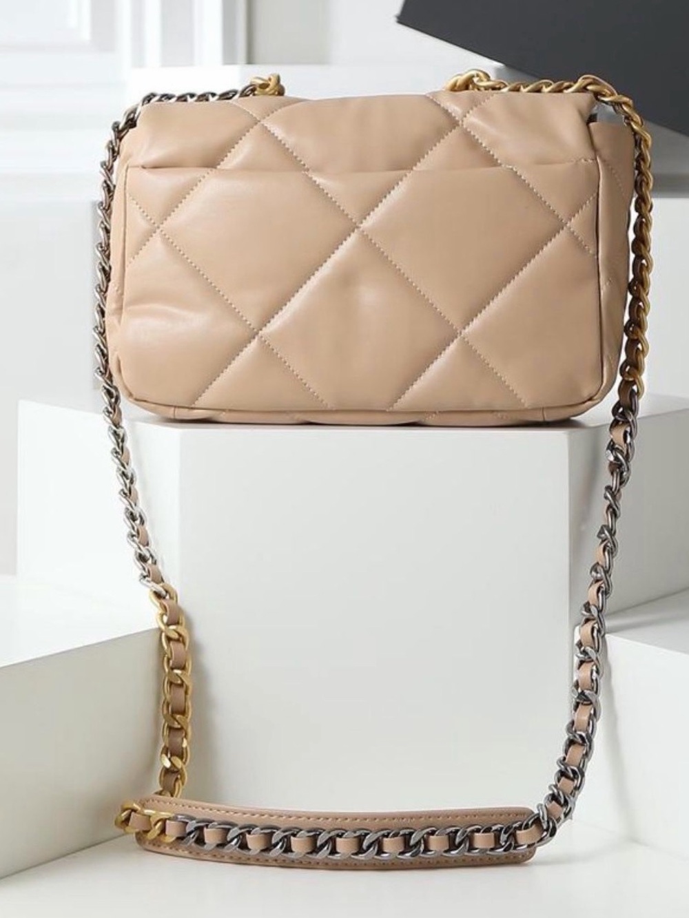 Women quilted lambskin leather shoulder taupe color bag.